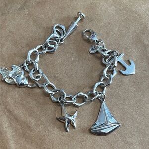 RARE TIFFANY AND CO, stamped Silver Charm Bracelet with Nautical Charms